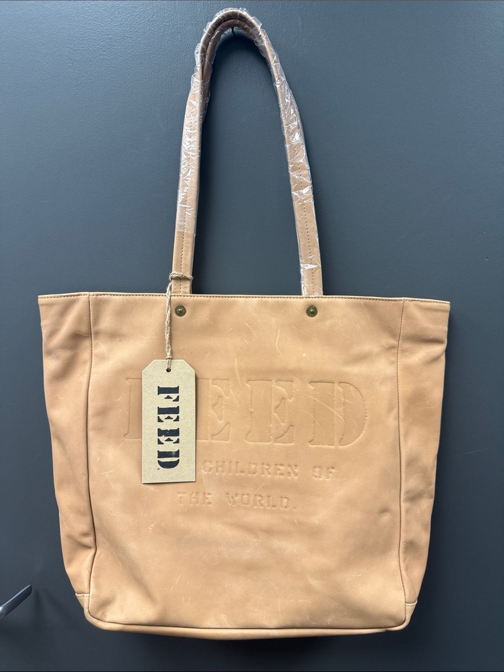 FEED Tan Leather Tote Bag with Embossed Logo